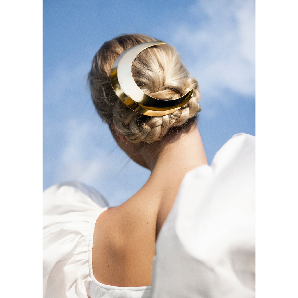 woman wearing Large Crescent Barrette – sculptural moon-inspired luxury designer hair accessory