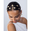woman wearing the Venus Headband by epona valley – 14K gold plated pearl and petal luxury designer hair accessory