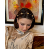 woman wearing the Field of Roses Circlet – 14K gold plated budding rose luxury designer hair accessory