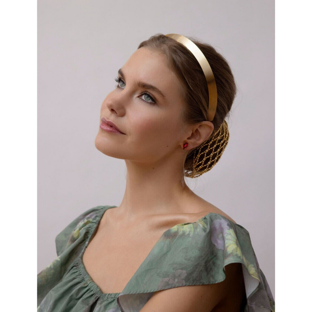 woman wearing Narrow spun crown headband – high-shine textured luxury hair accessory