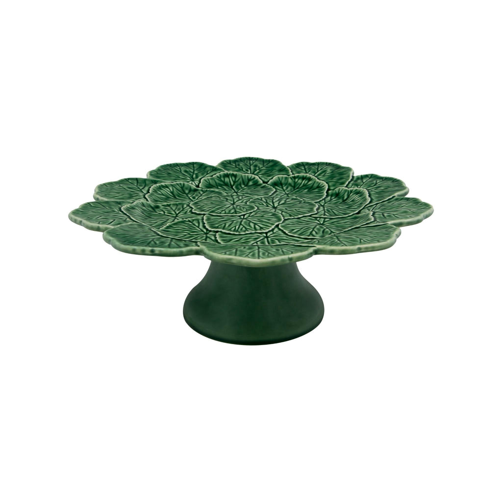 Bordallo Pinheiro Bordallo Pinheiro Geranium Cake Stand | Luxury Handmade Ceramics: This Geranium Cake Stand from the Bordallo Pinheiro Geranium collection is a standout piece of geranium leaf dish, botanical ceramic, green serveware, handcrafted in Portugal, Bordallo Pinheiro. Handmade in Portugal, it blends artistic detail with functional charm—perfect as a collector’s item or for elevating your daily table setting.
